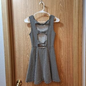 Open-back black with white polka dots dress